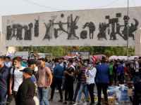 قتلى باحتجاجات "ساحة التحرير" وحظر للتجول في بغداد